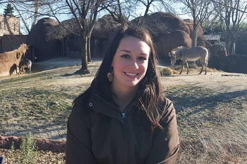 Emma Stafford poses at the zoo